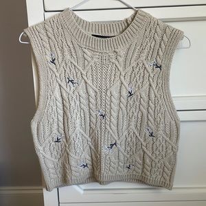 Cream Forever 21 sweater vest with navy and baby blue flowers